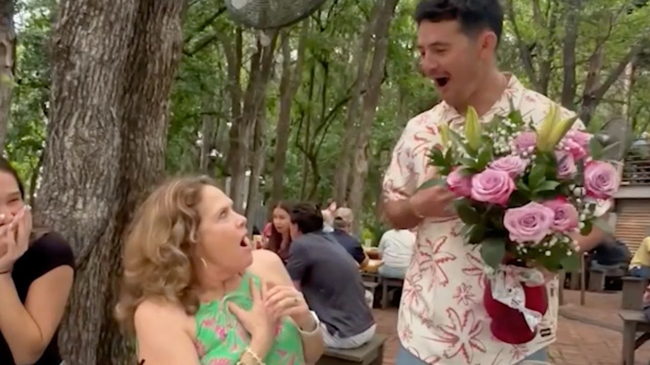 Airman Surprises Mom In Restaurant After Two Years Apart