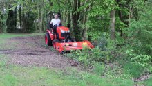 Outdoors clean up using a Kubota B2261 Compact Tractor and Front Flail Mower