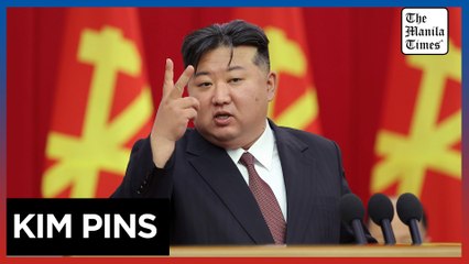 North Koreans debut Kim Jong Un pins
