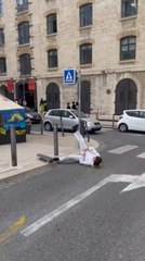 Girl Falls off Skateboard While Attempting Stunt on Street