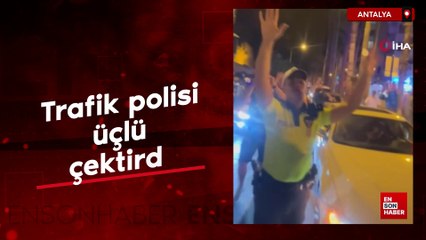 Antalya'da trafik polisi üçlü çektirdi