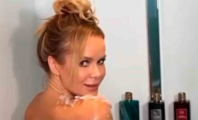 Amanda Holden loistaa rohkeassa suihkuvideossa vartalonhoitotuotteiden lanseerauksen yhteydessä