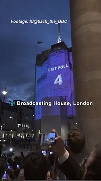 London crowds cheer as exit polls predict Labour landslide win