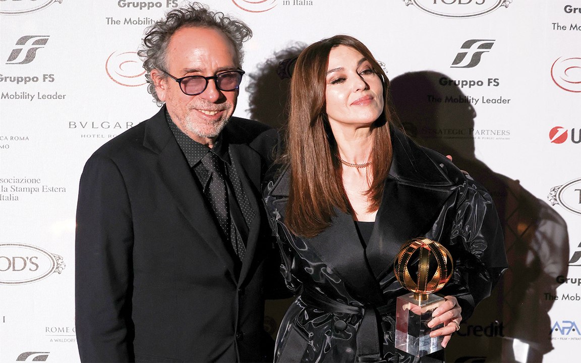 Globo d'oro con star: Tim Burton con Monica Bellucci, Sting con Trudie Styler