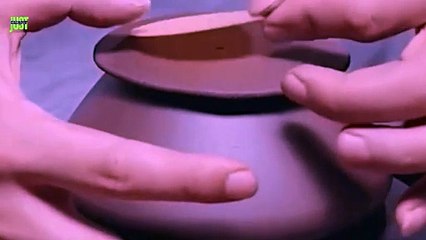 Master Craftsman Creates Clay Teapot Artistry in Action