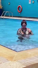 Beautiful girl in swimming pool