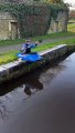 Kayaker Flips Across Canal!