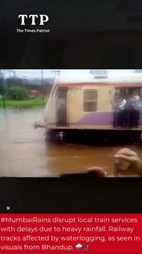 #MumbaiRains disrupt local train services with delays due to heavy rainfall. Railway tracks affected by waterlogging, as seen in visuals from Bhandup. ️