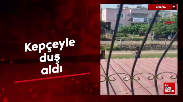 Adana'da kepçeyle duş aldı