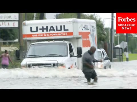 Flooding From Hurricane Beryl Makes Roadways Nearly Impassable For Pedestrians And Motorists