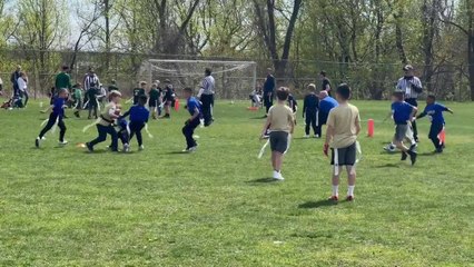 Kid Dodges and Weaves to Make Goal While Playing Football