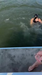 Woman Falls into Water While Playing Drinking Game