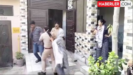 Hindistan'da aldatılan kadın, kocasına polislerin önünde tokat attı