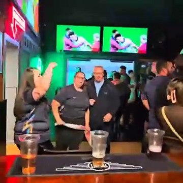 England football fans celebrate Euro 2024 semi final win against The Netherlands at The Met Sports Bar in Walsall