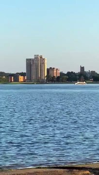 Half-sunk pleasure boat remains stuck in Detroit River after 20 people rescued