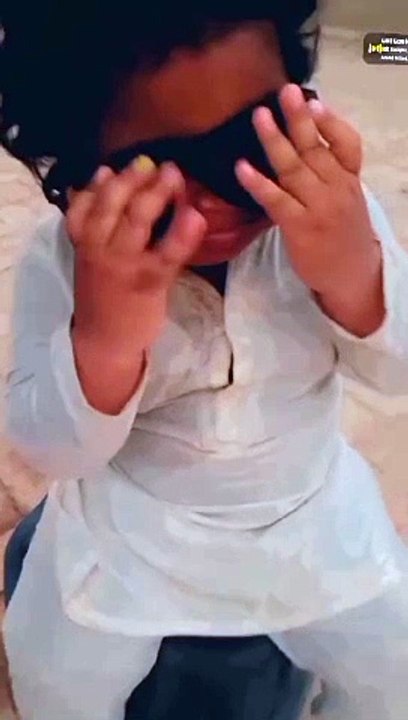 "Village's Adorable Child Spreads Joy "Charming Village Kid's Heartwarming Moments"Cute Village Boy's Playful Adventures" "Village Charm: The Sweetness of Childhood"