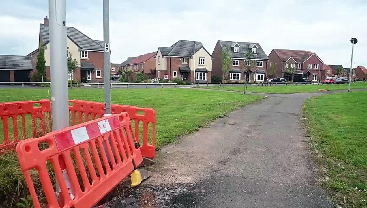 New build housing estate in Shrewsbury where developers have not even finished off roads and paths.