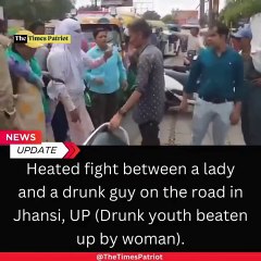 Heated fight between a lady and a drunk guy on the road in Jhansi, UP (Drunk youth beaten up by woman). #Jhansi #RoadRage #UPNews