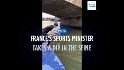 French sports minister takes symbolic dive into river Seine in Paris