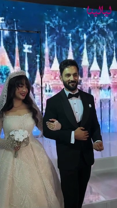 حسني شتا يرقص مع عروسته في زفافهم