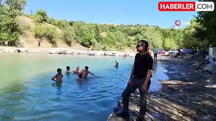 Tunceli'de sıcaktan bunalan vatandaşlar Tağar Çayı'na akın etti