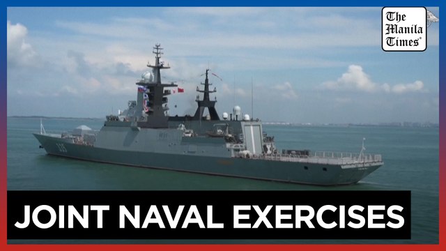 Russian warships arrive at a Chinese port for joint naval exercises