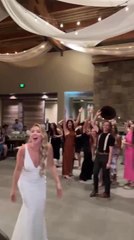 Bouquet Gets Caught in Ceiling Drapery After Bride Tosses it in Air