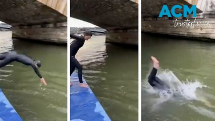 French minister dives into the Seine River to prove it's clean enough to swim