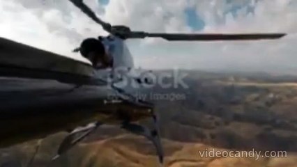 y2mate.com - A US Army helicopter flies over the mountains in Afghanistan_144p_merged