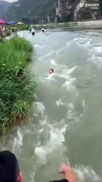 Brave Man Saves a Boy from drawning