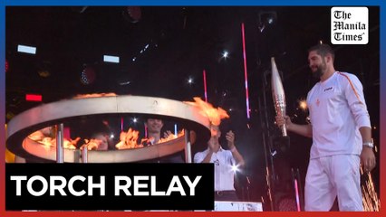 Olympic torch arrives at Place de la République in Paris