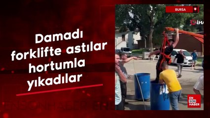 Bursa'da damadı forklifte astılar, bahçe hortumuyla yıkadılar