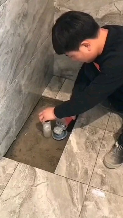 Installing tiles in washroom  