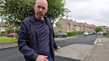 Resurfacing works around parked cars on Edinburgh street