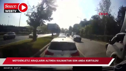 Motosikletli araç altında kalmaktan son anda kurtuldu