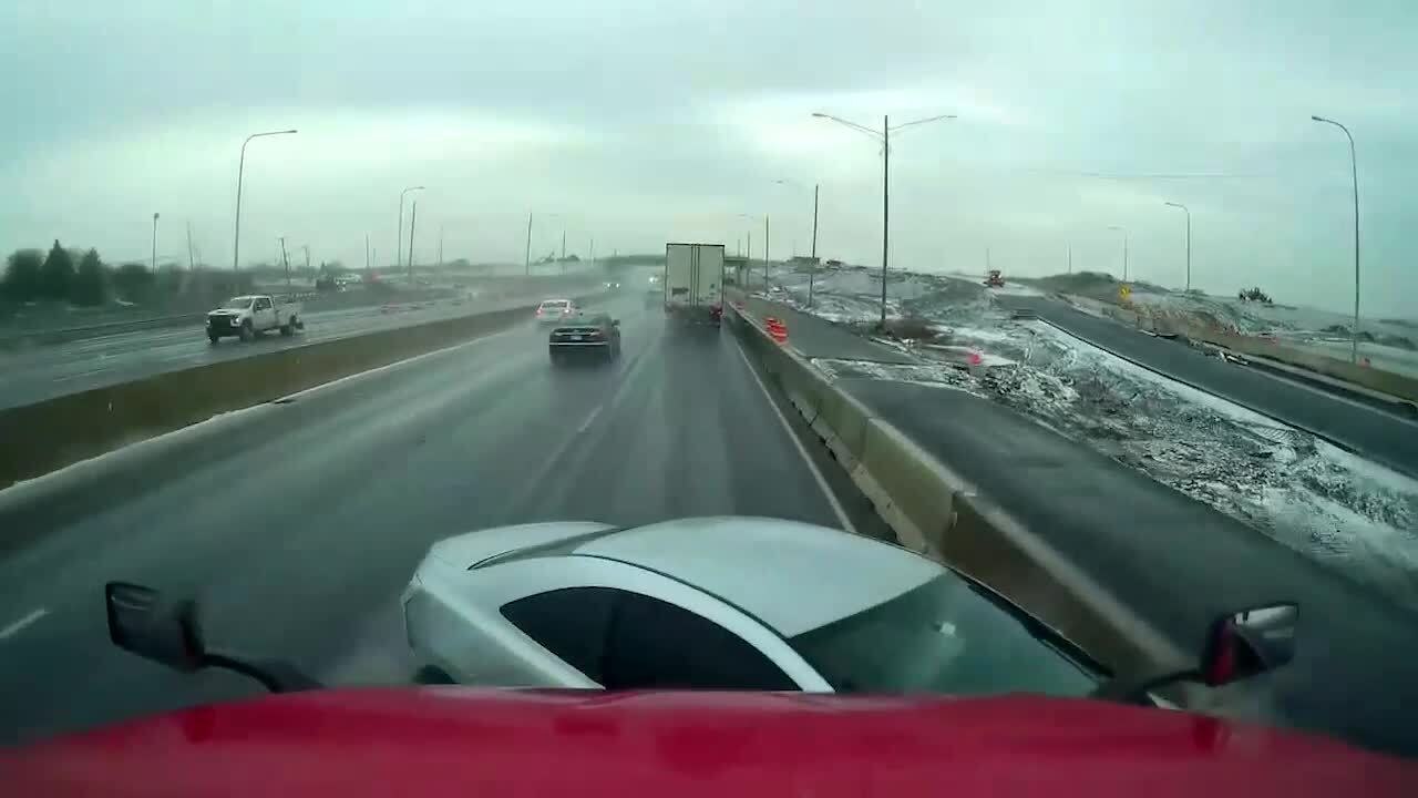 Car Loses Control on Wet Road in Saint Louis, Missouri