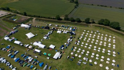 Thousands descend on sleepy village for Britain's biggest SWINGERS festival
