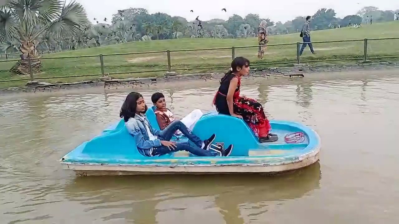 Kids enjoying boating at Model Town park Lahore