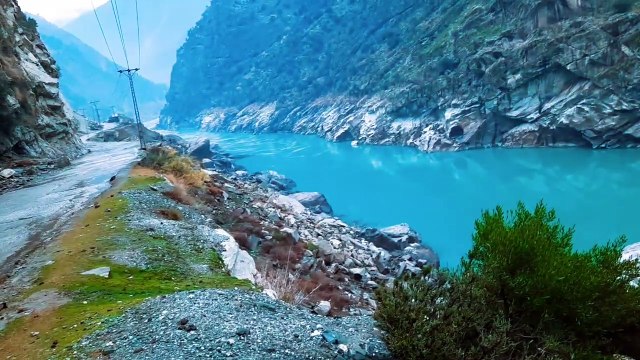 PASSING THE INDUS RIVER ALONGSIDE THE KARAKORAM HIGHWAY AT DASU
