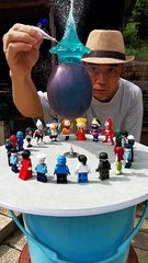 There is water in the balloon and what happened after removing the water with the help of a needle?