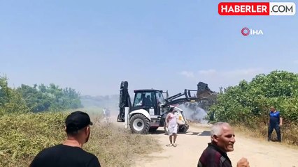 Antalya'da mezarlık yangını ormana sıçradı, mahalleliyi alarma geçirdi