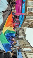 The world's laragest Pride flag carried though the town centre at Newquay Pride 2024 (2)