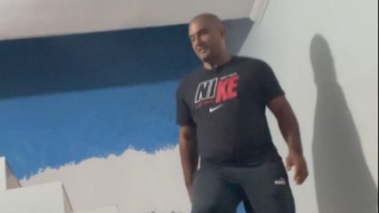 Man's unexpected staircase slip-up during mic test leads to a humorous comedy scene.