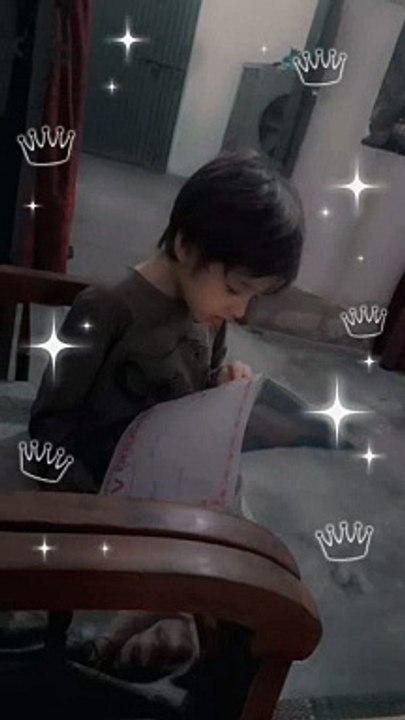 Kid reading book with song