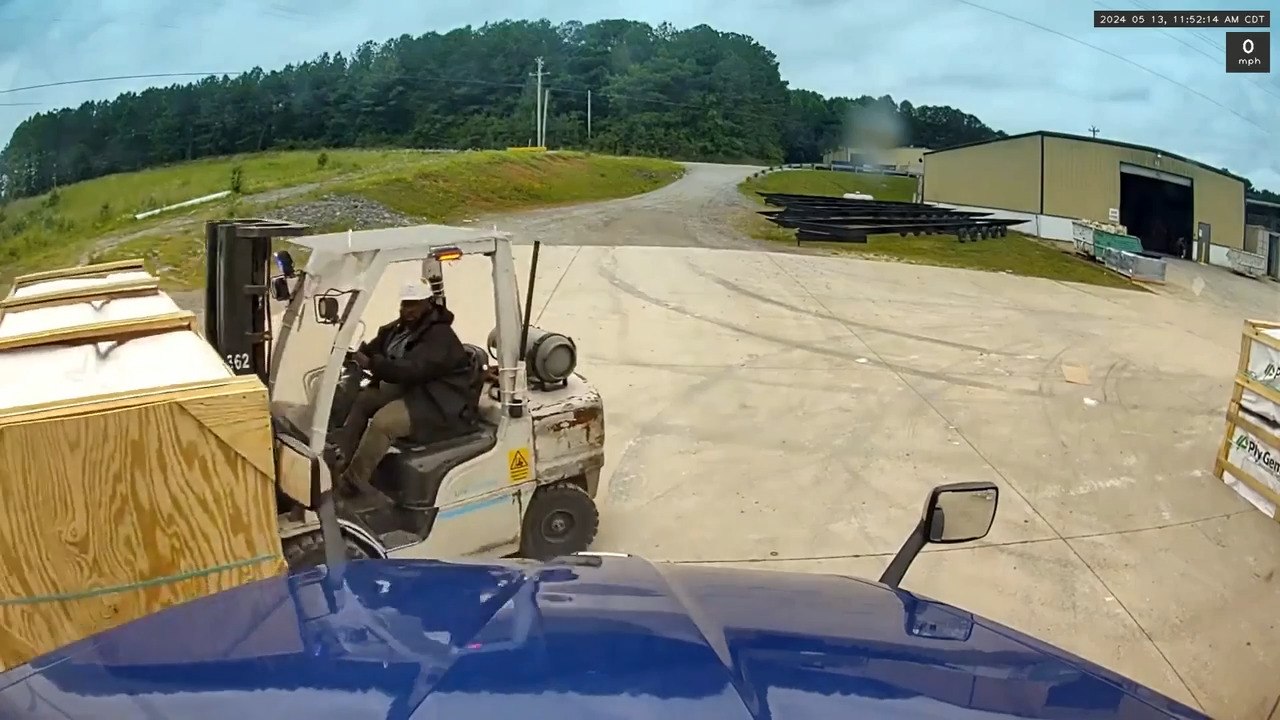 Forklift Operator Accidentally Breaks Truck's Rear View Mirror