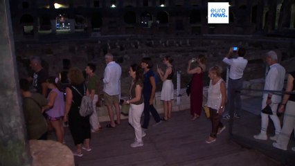 Visitors enjoy awesome spectacle of Rome's Colosseum at night