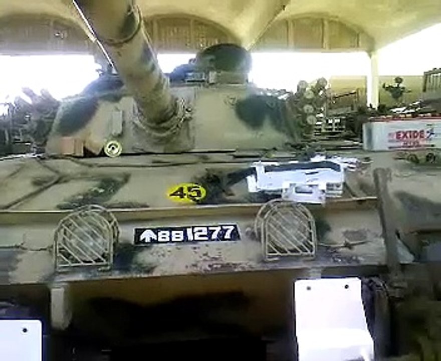 Capt Salman Sarwar Shaheed crawling through tank