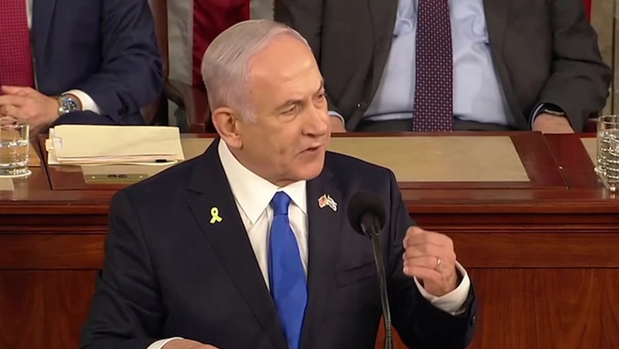 Rashida Tlaib holds up ‘war criminal’ sign during Benjamin Netanyahu’s Congress speech