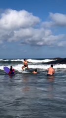 Girl Accidentally Hits Boy With Surfboard on First Surfing Lesson