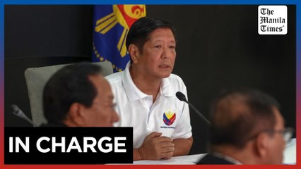 Marcos inspects flood-hit Valenzuela, distributes aid